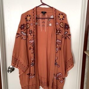 M/L rust colored, short sleeve, lite weight jacket